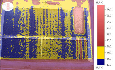 温度记录图和数字图像的叠加图,用以评价夏季妊娠舍中冷却板的运行情况。