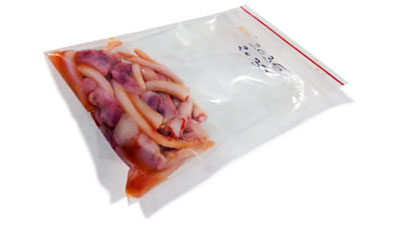 Collection of tails and testicles in a Ziplock bag